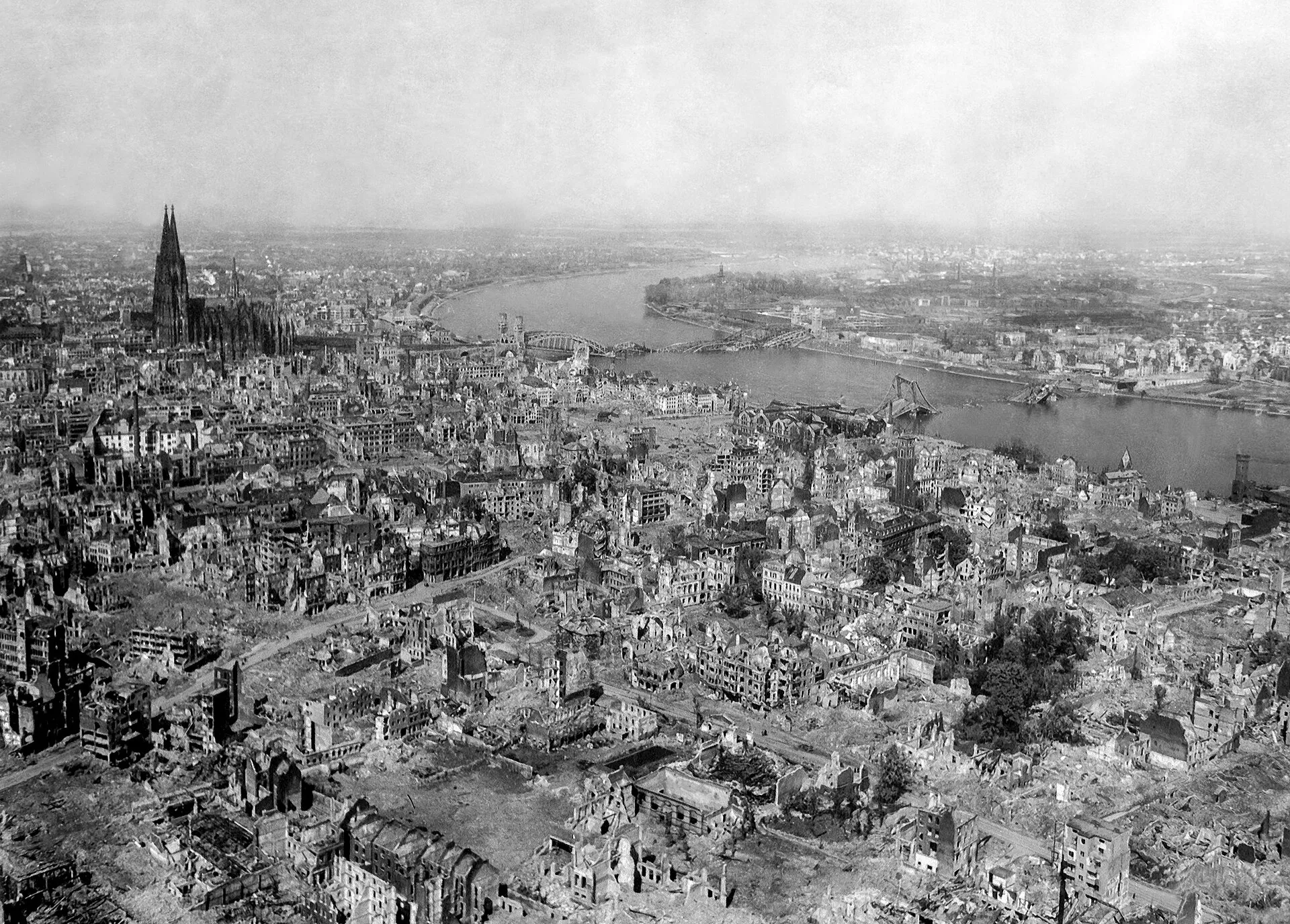 The Kölner Dom (Cologne Cathedral) stands seemingly undamaged (although having been directly hit several times and damaged severely) while entire area surroundi